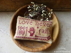 LOVE NEVER FAILS CROSS STITCH KIT