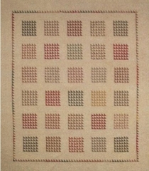 THE TRIANGLE QUILT PATTERN