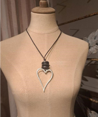SILVER HEART NECKLACE ON BROWN CORD